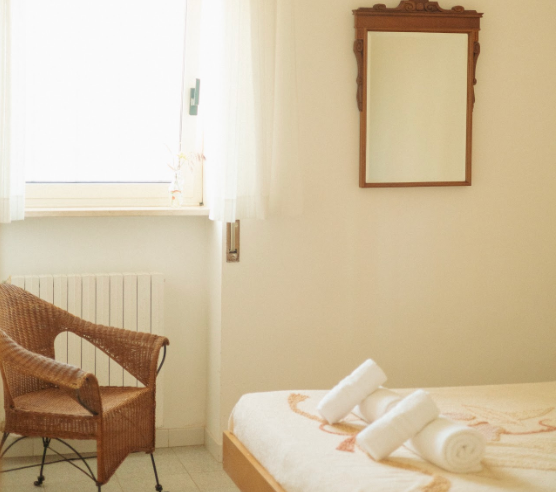 ensuite-room-seating-natural-light-coliving-italy.jpg