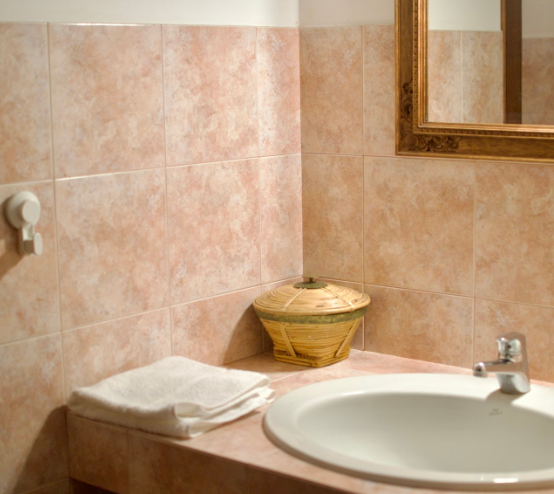 Shared Bathroom Sink in Single Room Area - Masseria Olga Coliving in Italy
